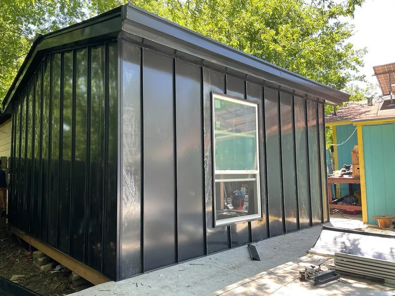 Black standing seam metal wall panels for Metal Roof Installation in Revere