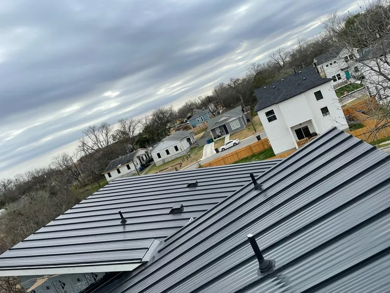 Standing seam metal roof panels with vents for Skylight Repair in Revere